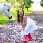 Girl Laughing With Pony 